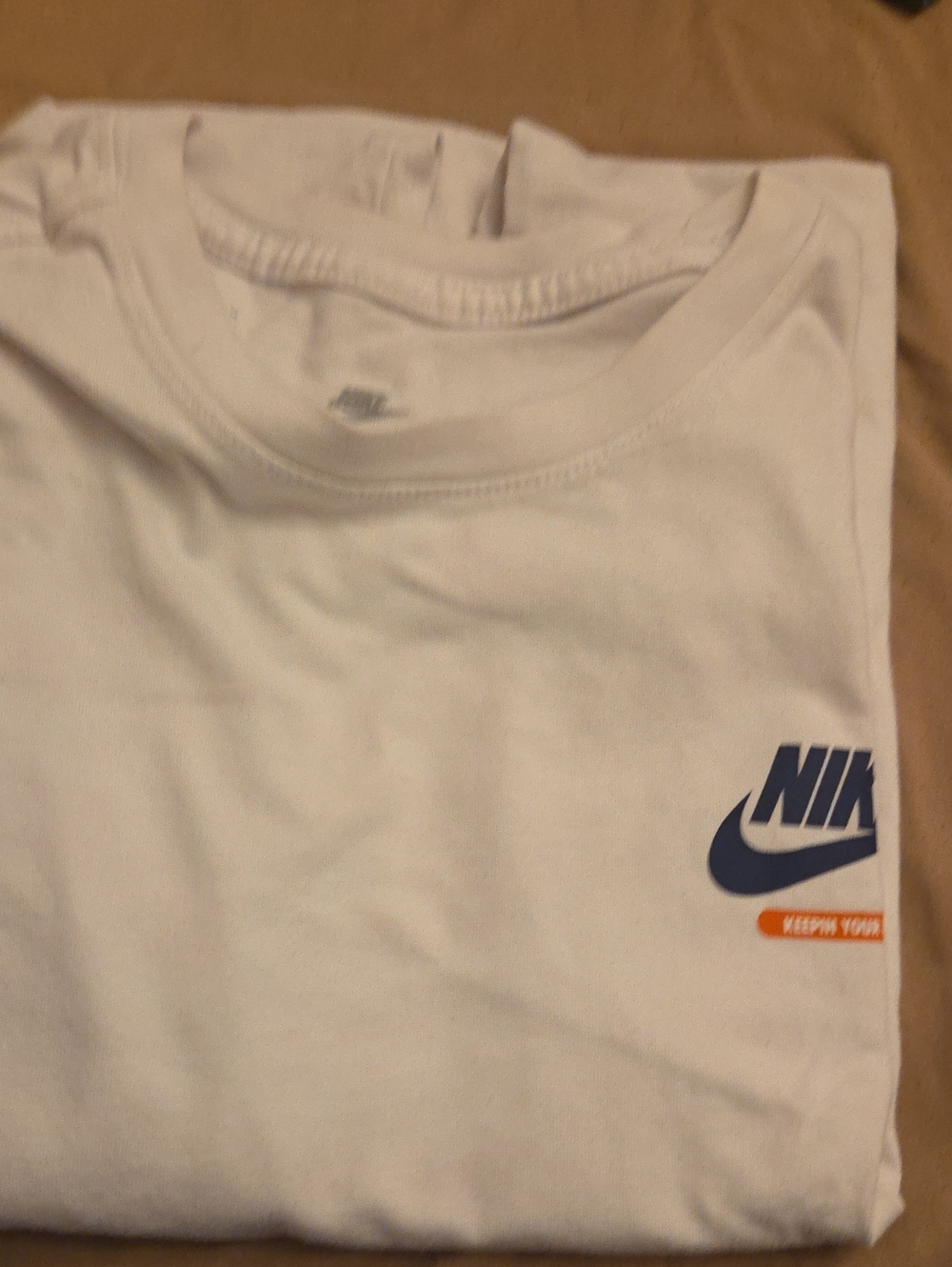 Nike White Tee with Navy Swoosh and Orange Accent